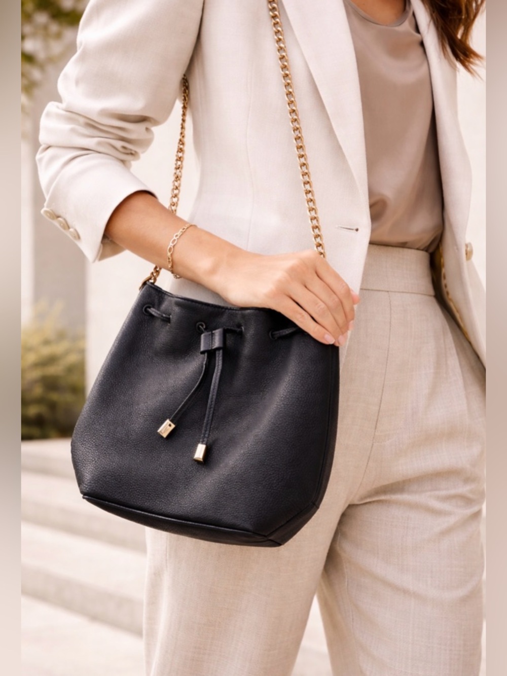 Danier Black Leather Drawstring Shoulder Bag with Gold Chain Strap